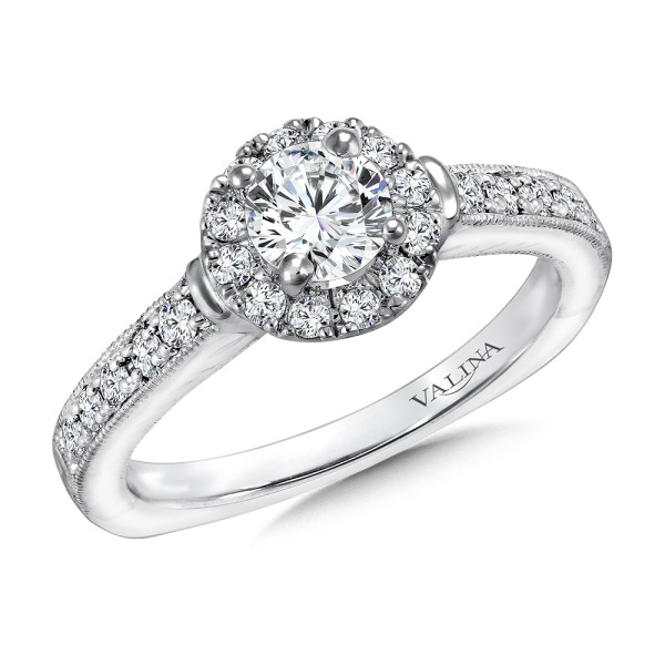 She will love this ornate round halo diamond engagement ring set in 14k white gold.