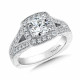 Hand engraved cushion-shaped halo diamond engagement ring set in 14k white gold.