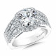 Cushion-shape diamond halo engagement ring set in 14k white gold.